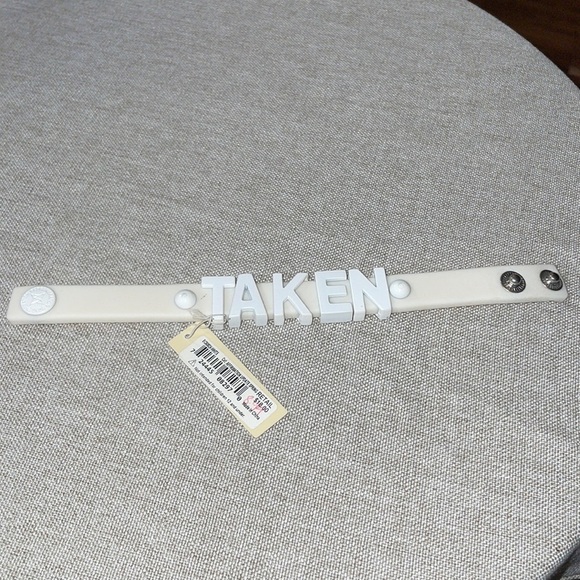 BCBGeneration Jewelry - Bcbgeneration. NWT White “Taken” Silicone Snap Bracelet